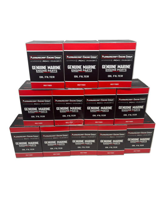 Stack of Plumas Marine Engine Parts oil filter boxes on a white background