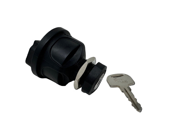 Black ignition switch with a key on a light gray background
