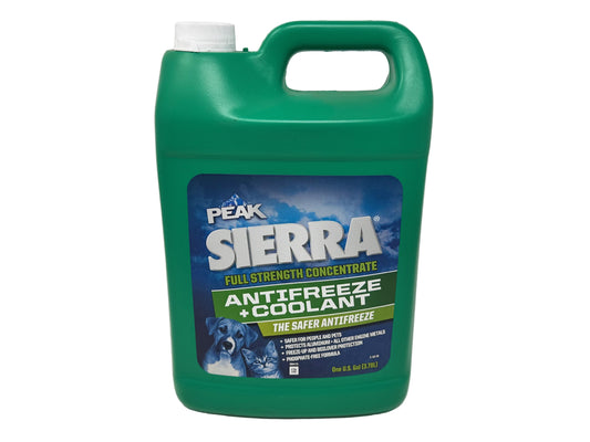 Green bottle of Peak Sierra antifreeze and coolant on a white background