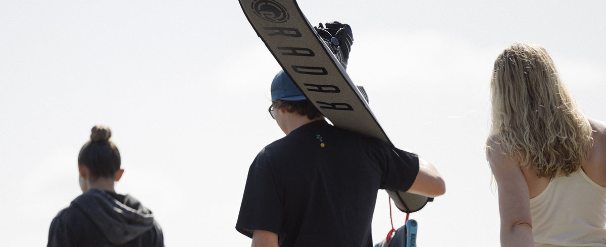 Radar Slalom Neo Sleeve protecting a waterski between lake sessions