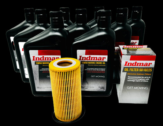 A set of Indmar oil service kits including several bottles of motor oil and one oil filter.