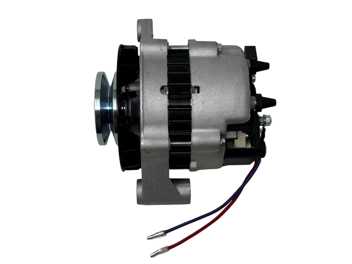 A used automotive alternator with a silver metal body, black pulley and internal components, and two wires (red and blue) extending from the side, photographed on a light gray surface.