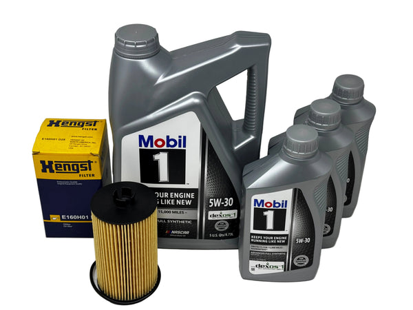Mobil 1 5W-30 motor oil set with a large 5-liter bottle, three 1-liter bottles, a yellow and blue Hengst filter box, and a cylindrical oil filter on a white background.
