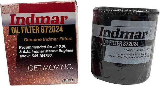 Indmar Oil Filter 872024 shown with its retail box on a plain white background. The box is red and black with the Indmar brand name, and the filter itself is a dark cylindrical cartridge wrapped in clear plastic with a matching label.