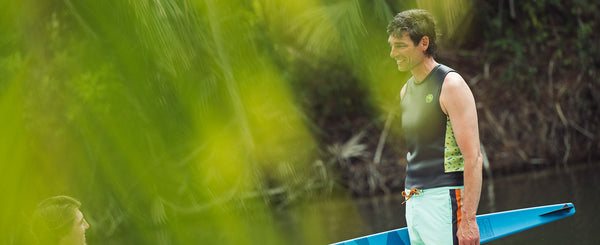 Waterskier wearing the Radar John Top sleeveless neoprene layer