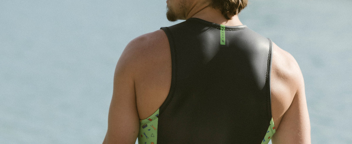 Waterskier wearing the Radar John Top sleeveless neoprene layer