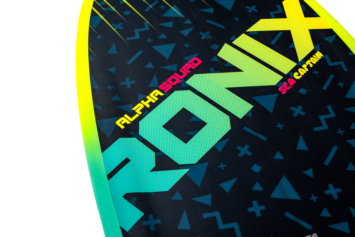 Close-up of a Ronix surfboard with geometric pattern and brand name.