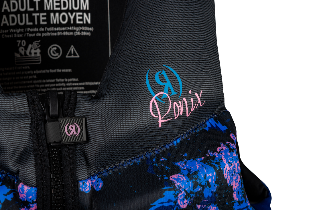Front logo of Ronix Daydream women's Coast Guard Approved life jacket