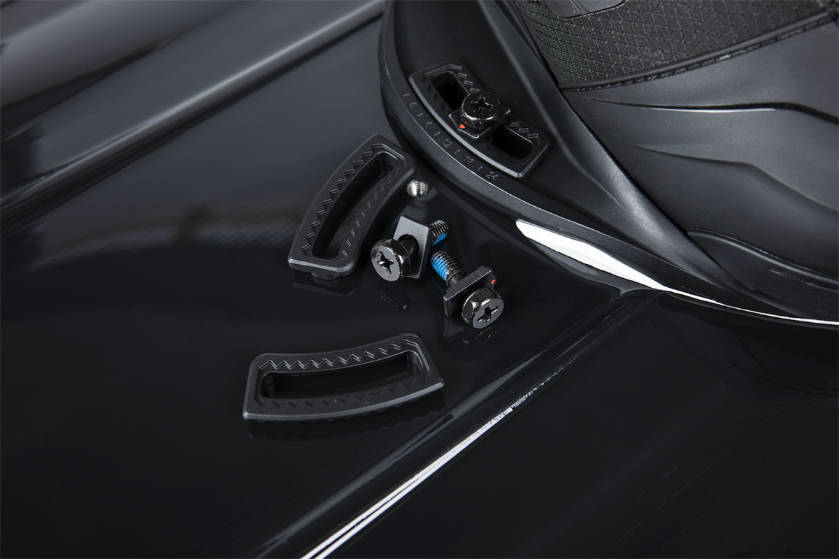 Ronix SharkTooth reinforcement insert installed in a compatible wakeboard boot plate